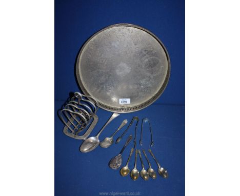 A silver George Smith and William Ferm stamped London 1791 serving spoon together with a heart shaped plated toast rack, two 