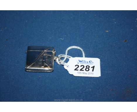 A late 19th c. silver Vesta case with embossed golfing images, stamped sterling 925.