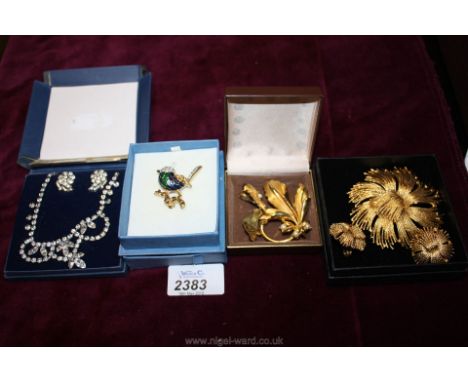 A vintage Monet brooch, earrings and Hollywood brooch and earrings, and Attwood &amp; Sawyer brooch