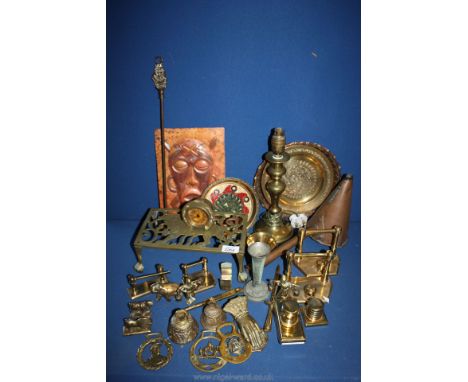 A quantity of copper and brass including a trivet, table lamp, pouring funnel jug, ornaments, horse brasses etc.