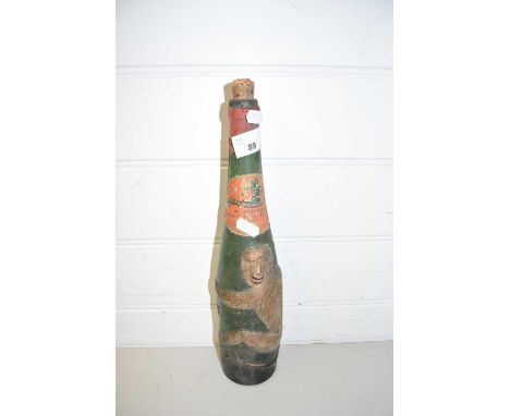 VINTAGE GLASS BOTTLE DECORATED WITH A MONKEY