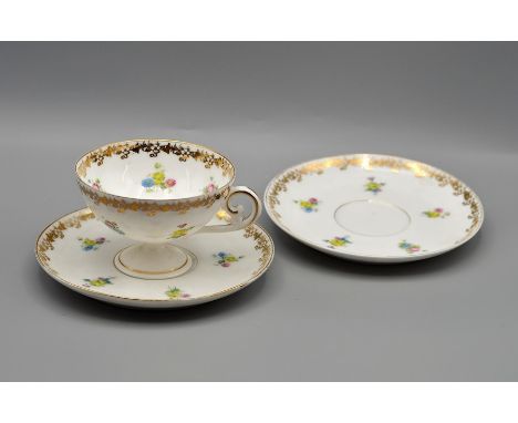 A pair of glass bud vases 25cm tall and a fine bone china cup and 2 saucers 