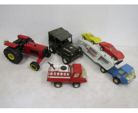Tonka vehicles inc lorry transporter with cars, jeep, tractor and fire engine