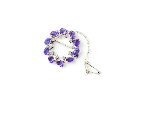 9ct gold diamond and amethyst set circular brooch 5.8g