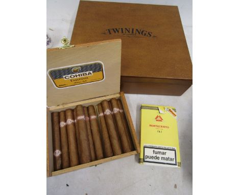 Exquisitors cigars, Montecristo cigars and a Twinings tea caddy