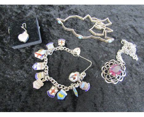 Silver charm bracelet with enamel souvenir hallmarked charms, necklace stamped 925 with blue stones, locket and chain marked 