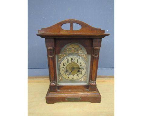 Oak cased mantel clock with key (top piece needs reattaching)&nbsp;