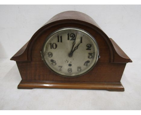 A mantle clock with key