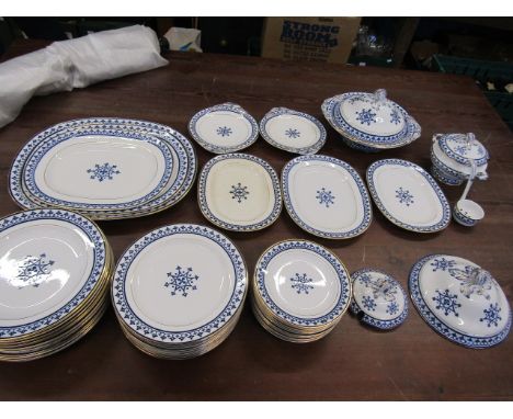 Minton's 'Gothic' dinner service circa 1880 comprising 12 dinner plates, 12 side plates, 12 cake/sandwich plates, 3 graduatin