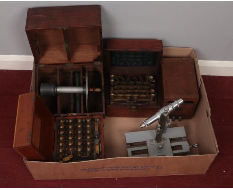 A box of scientific instruments. Including Galvometer, bridge testers and microscope by Philip Harris Ltd Birmingham England.