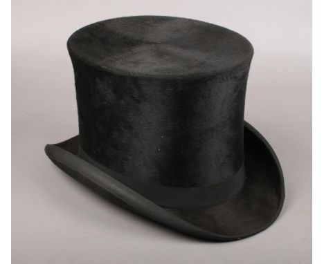 A R H Ramsden top hat. Front to back 20cm. Left to right 17cm.  