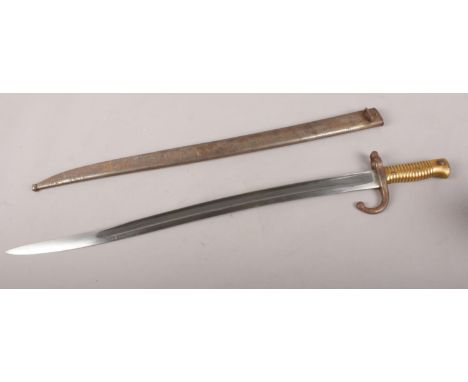 A 19th Century French chassepot bayonet, with inscription dated 1868 with scabbard. 69cm length.  