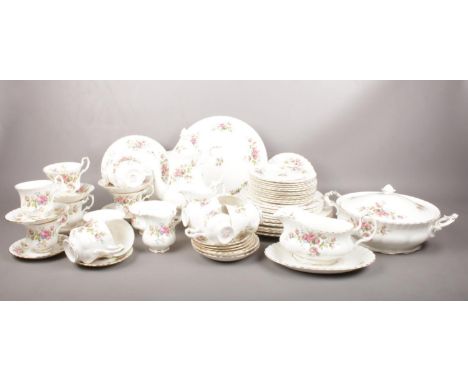 A Royal Albert ' Moss Rose' tea &amp; dinner wares. 61 pieces.  Coffee cups, Tea cups, saucers, dinner plates, milk jugs, sug