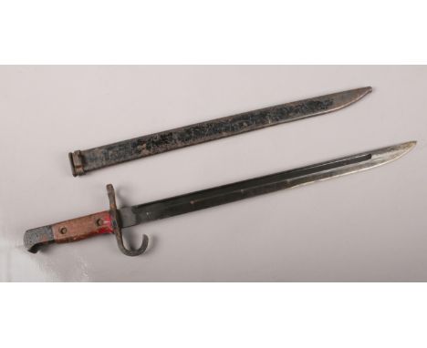 A WW2 Bayonet with scabbard. 52cm length.  