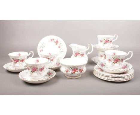 A Royal Albert 'Lavender Rose' tea set.  tea cups, saucers, tea plates, Milk jug, sugar bowl.  