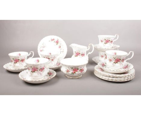 A Royal Albert 'Lavender Rose' tea set.  tea cups, saucers, tea plates, Milk jug, sugar bowl.  