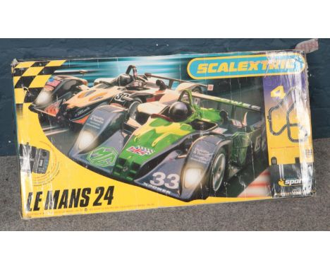 A boxed Scalextric Le Mans 24, including track and cars.  