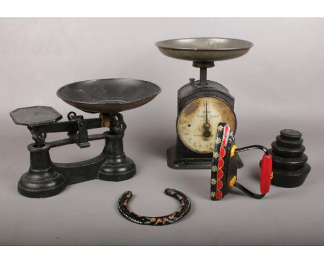 A group of miscellaneous. A Hughes family scale, vintage weighing scales and weights, cast iron decorative horse shoe etc  