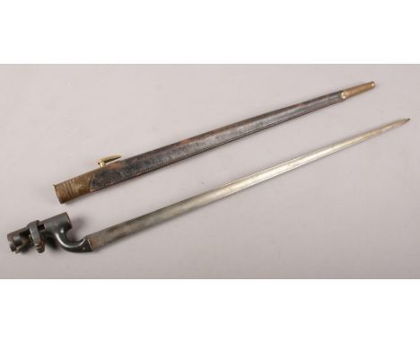 A WW2 socket Bayonet with scabbard. Marked 3920. 64cm length  
