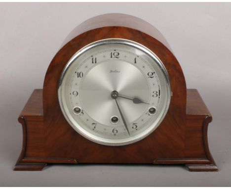 A Mahogany Bentima Mantel Clock.  Condition Good, Chimes Quarterly but does not run.
