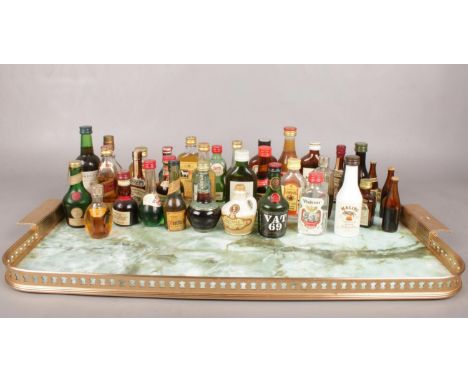 A quantity of assorted alcohol miniatures. Some full &amp; sealed. Bell's Old Scotch Whisky, Gordon's Special Dry London Gin,
