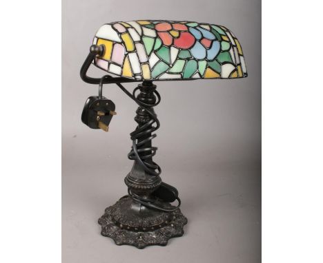 A Tiffany style desk lamp.  