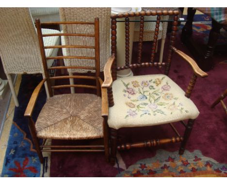 A late 19th Century bobbin turned open elbow chair, with tapestry seat together with a late 19th Century beech ladder back lo