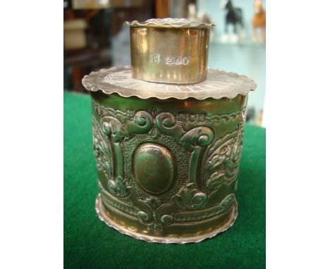 A late Victorian silver foliate embossed tea caddy with pull off lid, London, 1899 by Josiah Williams & Co, 9cm high, approx 