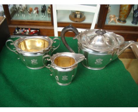 An Edwardian silver three piece tea set, Sheffield, 1902 by Roberts & Belk Ltd, oval shaped form, initialled K E, approx 1090