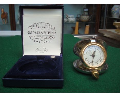 A boxed Dalvey Voyager travel alarm clock (with paperwork). 