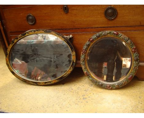 A 1920's gilt and black chinoiserie framed oval mirror and a small circular barbola mirror (2). 