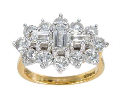 An 18ct diamond set dress ring with 2ct total diamond weight approximately. The head set with three baguette cut diamonds, th