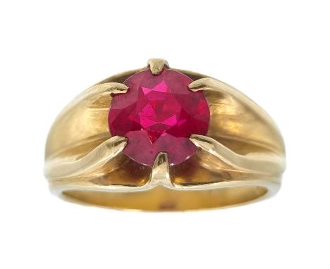 A 14ct synthetic ruby set ring. The ruby measuring 8.2mm, stamped 14k, size Q, 7.9g.