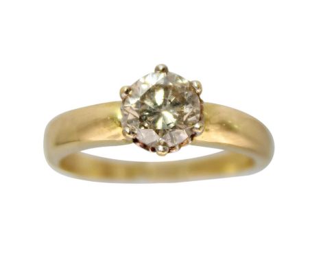 An 18ct 1.03ct (approx.) diamond solitaire ring. The round cut diamond of approximately Q colour, clarity PK2, within a six c