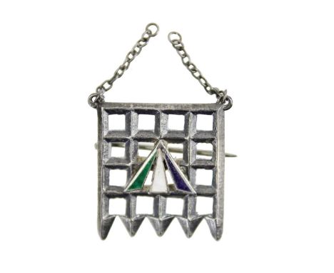 An extremely rare Suffragette silver and enamel Holloway Prison brooch by Toye & Co London.  In the form of a portcullis and 