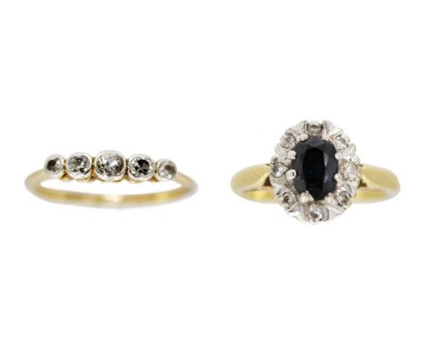 Two 18ct diamond set rings. One is a graduated five stone ring, the largest stone estimated as 0.07ct, in collet setting, siz