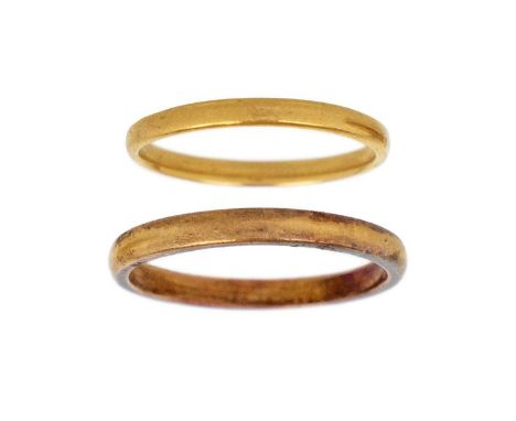 Two 22ct gold band rings. The larger hallmarked Birmingham 1930, size Q 1/2, the smaller ring hallmarked London 1938, size L,