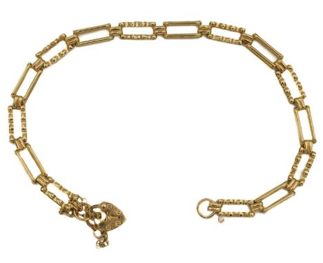 A 9ct two bar gate bracelet with padlock clasp. Birmingham hallmark, length 17.5cm, 2.6g.