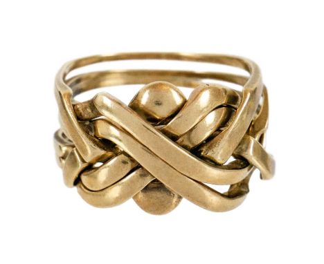 A 9ct gold six-band puzzle ring. Stamped 375, 8.9g.