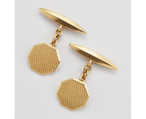 A PAIR OF ART DECO CUFFLINKS, octagonal engine-turned heads chain-linked to panelled bullet backs, marked '18CT'. 8.0 gramsCO