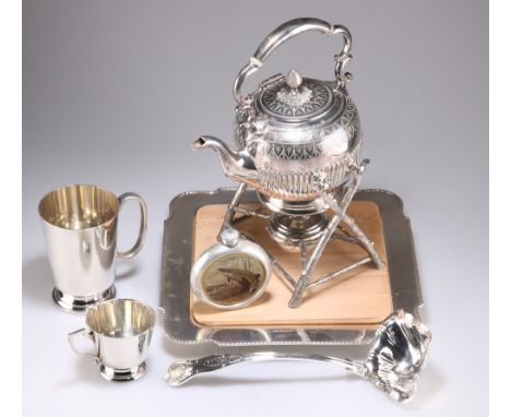 A COLLECTION OF SILVER-PLATE, including a spirit kettle on a bark effect stand; a mug; a cup; a punch ladle; a square tray on