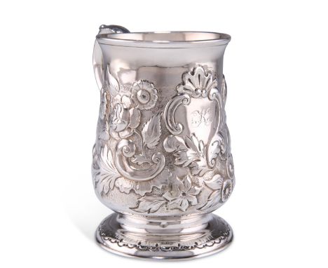 A GEORGE III PROVINCIAL SILVER MUG,&nbsp;by John Langlands I, Newcastle 1770, of baluster form with leaf-form thumbpiece,&nbs