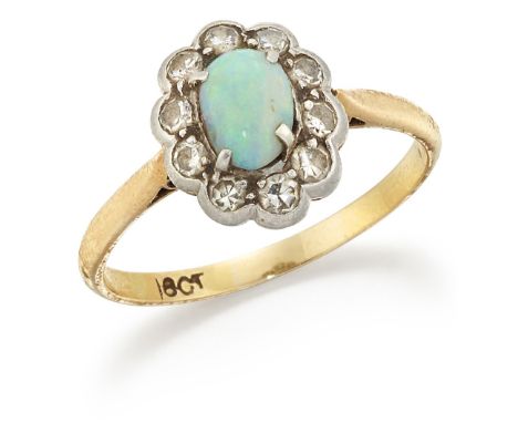 AN OPAL AND DIAMOND CLUSTER RING,&nbsp;an oval opal within a border of eight-cut diamonds, to knife-edge shoulders, total est