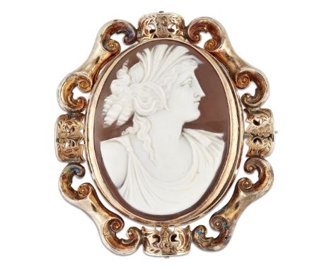 A VICTORIAN SHELL CAMEO AND HAIRWORK BROOCH, depicting the bust of Ceres, the reverse with a panel of tightly woven hair behi