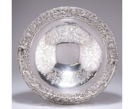 AN EDWARDIAN SILVER CELLINI PATTERN CAKE BASKET,&nbsp;by&nbsp;Mappin &amp; Webb Ltd, London 1903, circular with swing-handle,