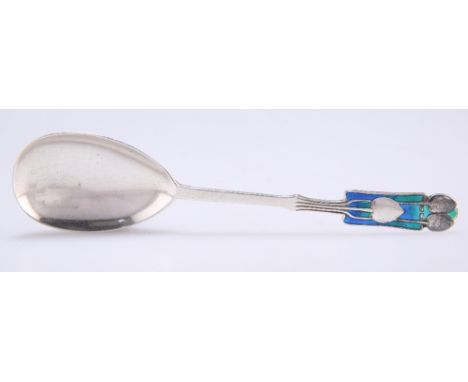 AN ARTS AND CRAFTS SILVER AND ENAMEL SPOON,&nbsp;by&nbsp;Liberty &amp; Co Ltd, Birmingham 1929, the terminal picked out in bl