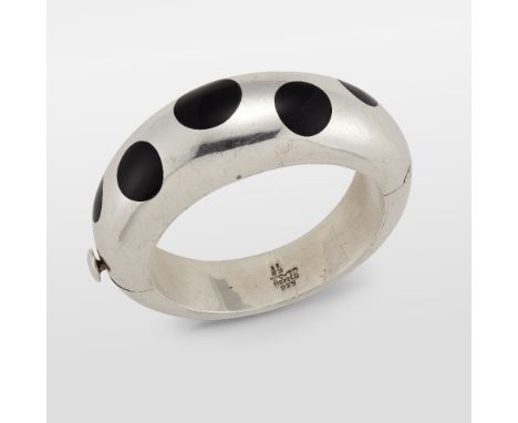 JUAN SANDOVAL VASQUEZ TWO TREES - A TAXCO MEXICAN SILVER AND ENAMEL HINGE OPENING BANGLE, of tapering form and decorated with