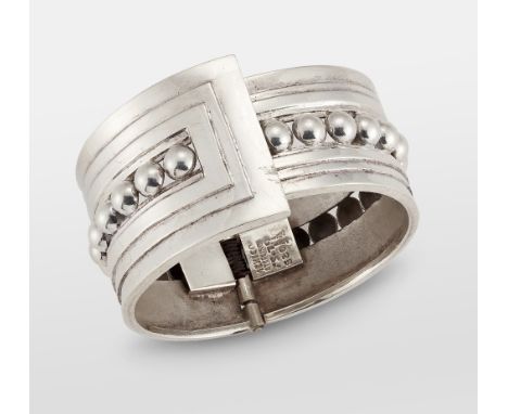 JUAN SANDOVAL VASQUEZ TWO TREES - A TAXCO MEXICAN SILVER HINGED BANGLE, of tapering form with fluted and beaded decoration, T