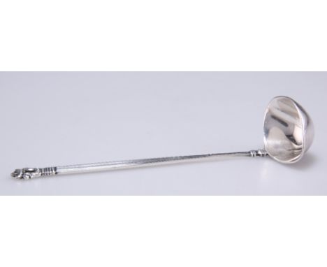 A DANISH STERLING SILVER SAUCE LADLE, by Georg Jensen, import marks, George Stockwell,&nbsp;London 1929. 14cm