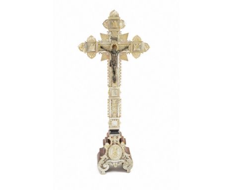 Crucifix dating: circa 1900 provenance: Romania Silvered metal on wooden cross, with base, with sculpted, engraved, mother of